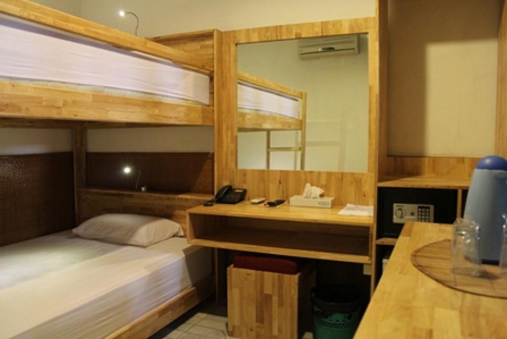 קוטה לומבוק Hotel Karthi Kuta חדר תמונה